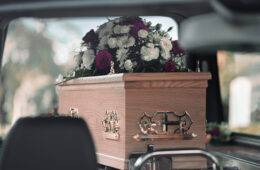 Beautiful flower arrangement used in a bouquet display for a funeral on a coffin in a hearse